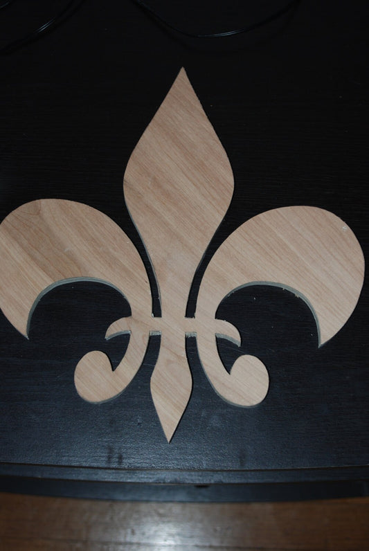 Unpainted fleur de lis cut out shape