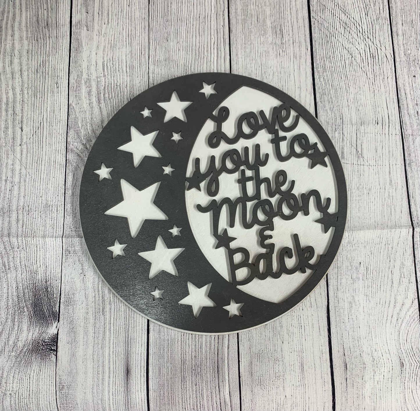 I love you to the moon and back nursery door hanger