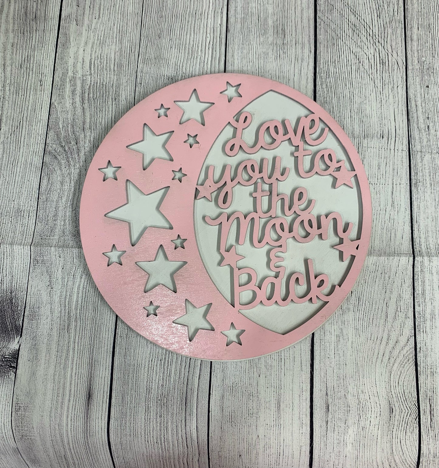 I love you to the moon and back nursery door hanger
